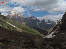        . view down the valley to mountains behind Arch river